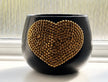 The Golden Child black indoor plant pot with sparkling dark gold crystal heart
