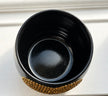 Top view of The Golden Child black ceramic planter showing the planting opening