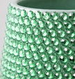 Jade green decorative ceramic plant pot shown in close-up with sparkling jade green  crystal detailing
