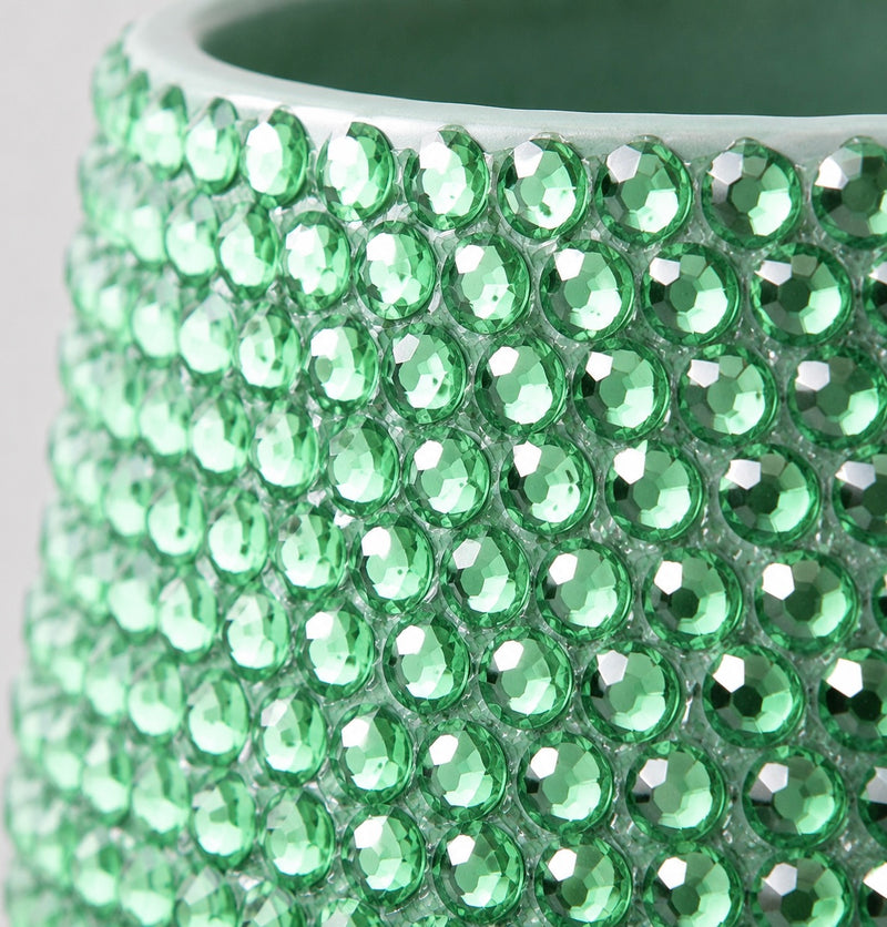 Jade green decorative ceramic plant pot shown in close-up with sparkling jade green  crystal detailing
