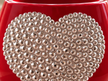 Close-up of Ma Cherry red decorative ceramic planter with clear crystal heart detail