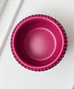 Magenta fuchsia decorative ceramic plant pot viewed from above, showing the planting opening and crystal detailing

