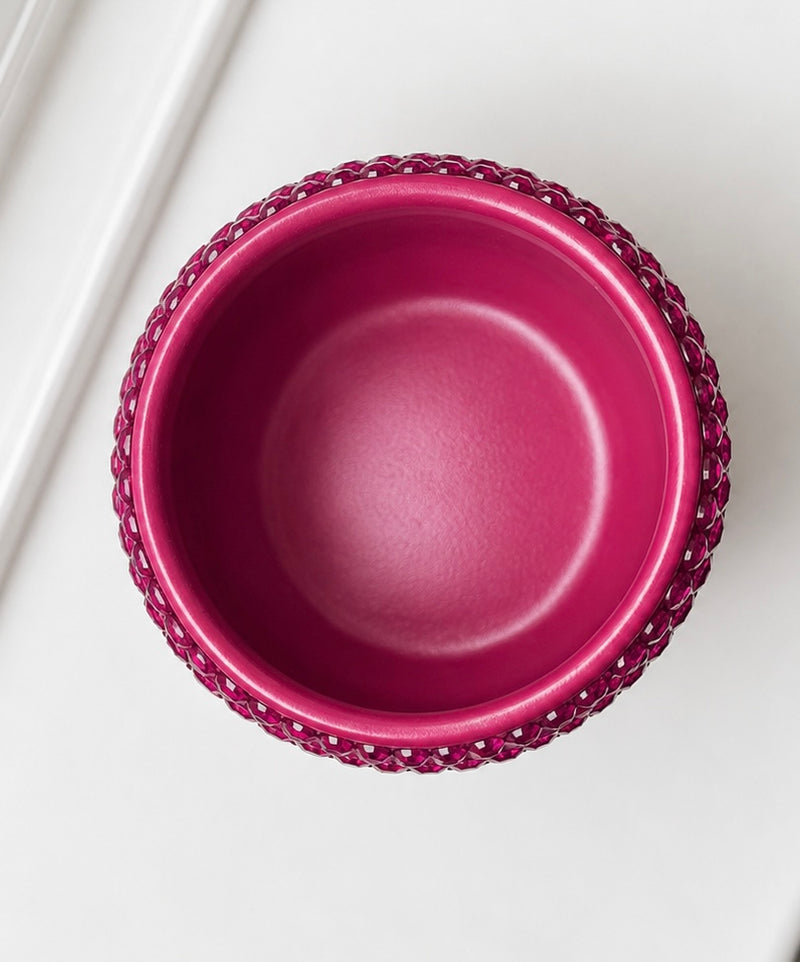 Magenta fuchsia decorative ceramic plant pot viewed from above, showing the planting opening and crystal detailing
