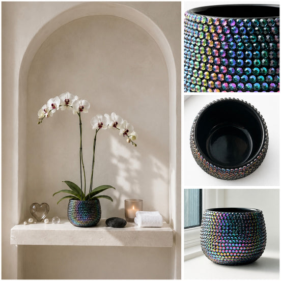 A decorative cylindrical planter covered in iridescent crystal stones, shown in a styled interior scene with white orchids on a shelf, plus close-up inset views of the planter's front, interior, and bottom.