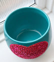 A close up shot of Teal Me Blue plant pot showing the plant pot mouth opening 